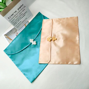 Wholesale folding plate buckle satin bag cheongsam clothing packaging cloth bag tacasha creative flip satin cloth bag