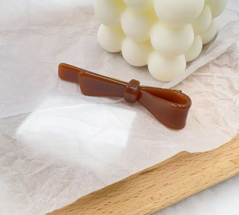 A6-아세테이트 사이드클립-나비넥타이-카라멜색상