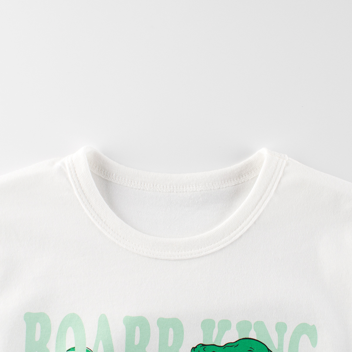 27 niños estilo coreano ropa para niños verano nuevo suministro transfronterizo dinosaurio de dibujos animados Camiseta de manga corta para niños ropa de bebé para niños