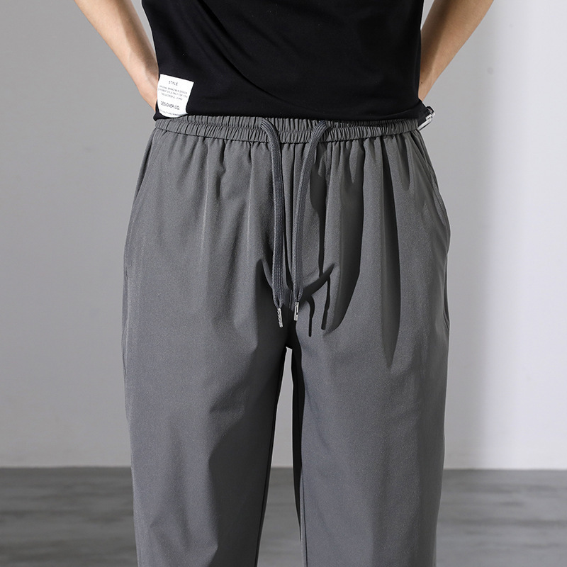 Otoño y primavera de verano de tendencia suelta pantalones casuales de pies de hielo pantalones de hombre nueve pantalones fuente de fabricación