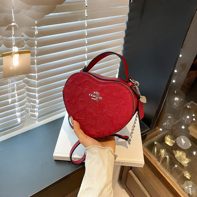 Bolso de mano en forma de corazón de comercio exterior, bolso de hombro de impresión de moda creativa, bolso de hombro simple, bolso de hombro de dama de Europa y América.