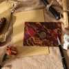 3 burgundy envelopes + 8 pieces of kraft lined letter paper + 3 fire-paint seals [fire-paint wax material]