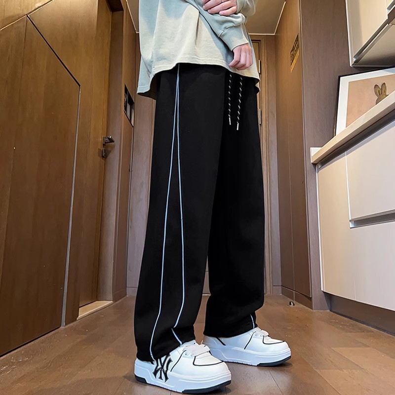 Pantalones de moda para hombres otoño 2025 nuevos pantalones casuales rectos sueltos de moda para hombres jóvenes pantalones deportivos de piernas anchas
