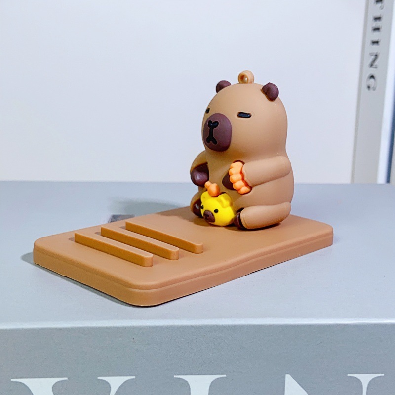 外国貿易新しいカピバラ携帯電話ホルダー漫画かわいいカピバラ人形クリエイティブデスクトップ装飾品小さなギフト|undefined