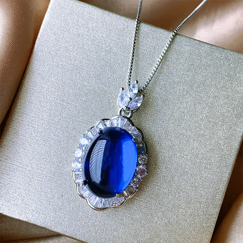 Zhuang Sheng joyería plantación de hielo fluorescente denier paloma sangre azul cristal puntiagudo cara llana Jade colgante traje 13*18-10*12