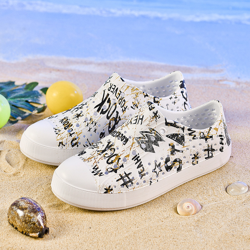 LUCHI zapatos con agujeros pareja verano nuevo estilo graffiti transpirable vadeo hueco hombres y mujeres sandalias de playa casuales en stock