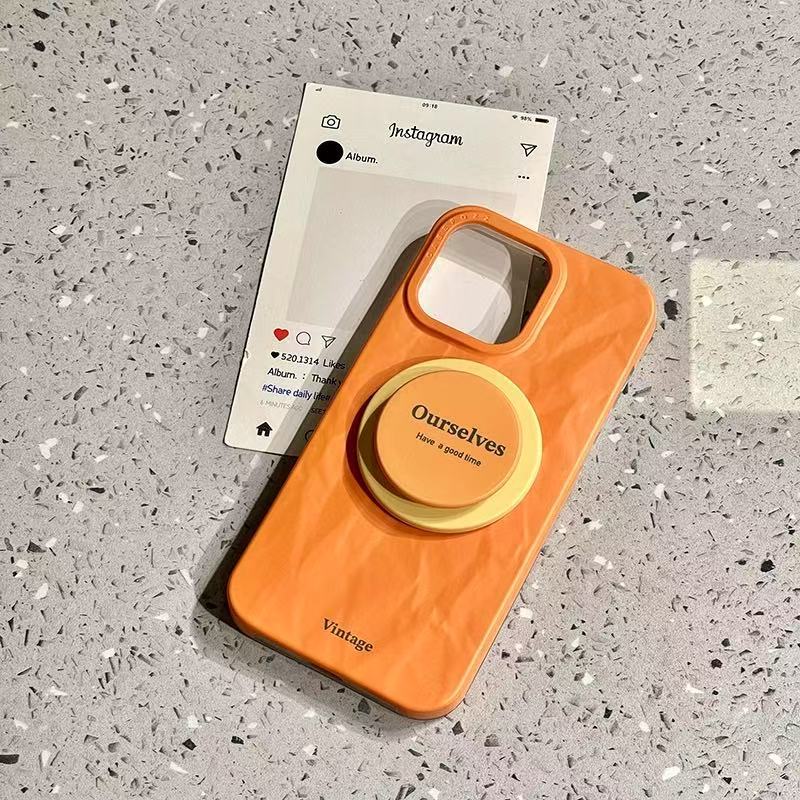 Soporte magnético plisado inglés simple para iPhone16ProMax funda para teléfono móvil 14 Apple 15 pareja 13 nuevo