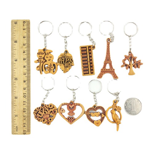 Cute imitation peach wood key chain pendant, street stall supply key pendant, e-commerce small gift professional wholesale