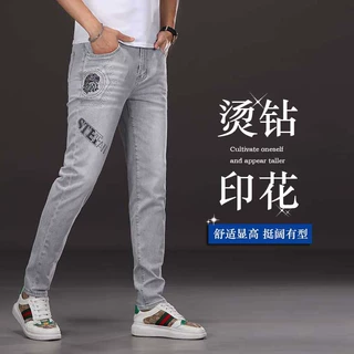 2025春夏高端烫钻烟灰色牛仔裤男百搭修身小脚潮牌弹力休闲长裤子