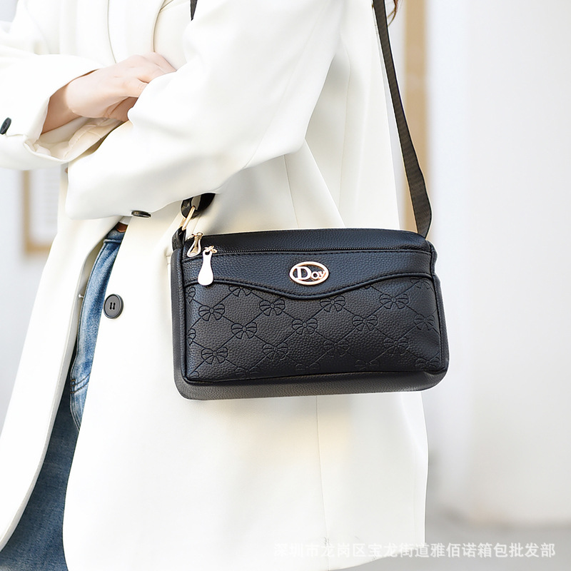 Bolsos de mujer de venta caliente transfronterizos Bolsos de mensajero de mujer rentables Bolsos de madre de mediana edad de un solo hombro de moda de cara suave