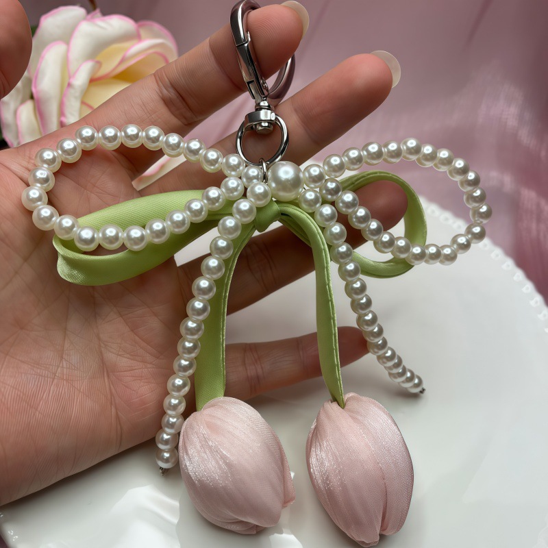 Venta caliente transfronteriza colgante de tulipán colgante de lazo llavero decoración de bolsos de mujer accesorios perlas al por mayor
