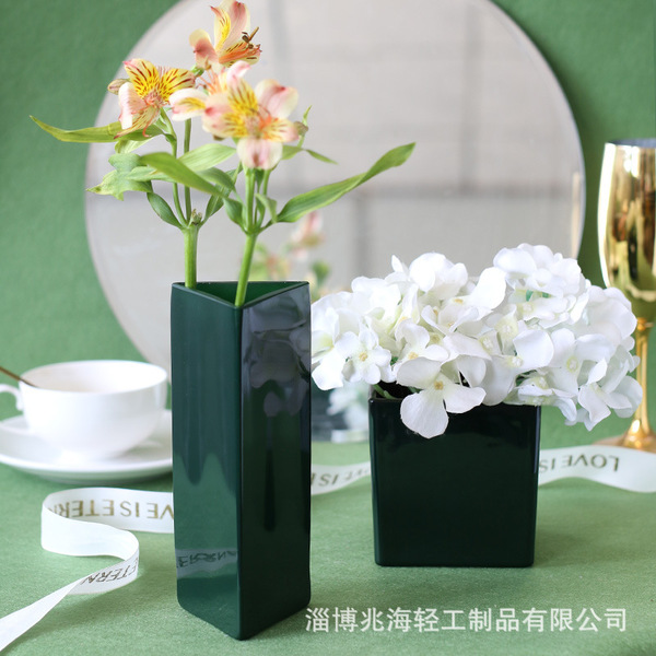 Medieval dark green and black French glass vase