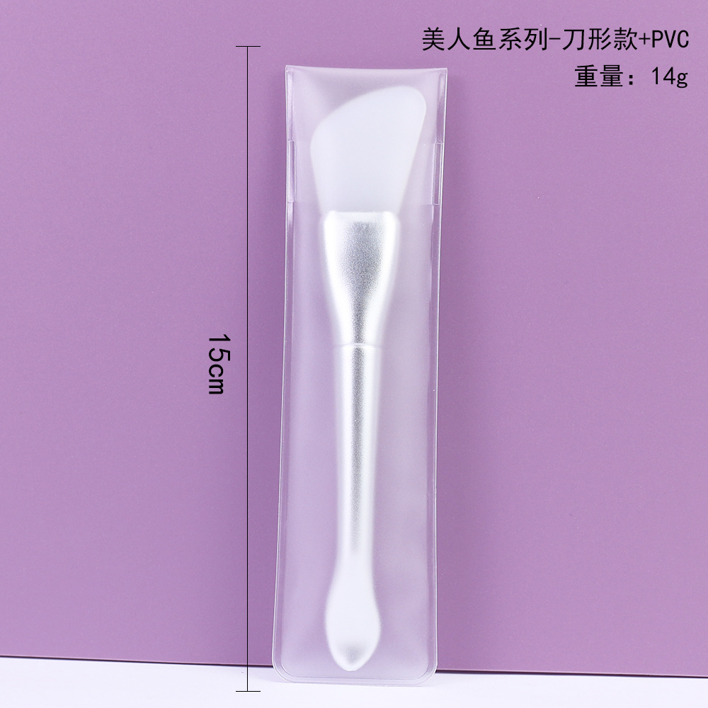 Cepillo de mascarilla de silicona con cuchillo de cola de pez todo en uno plateado paquete de PVC