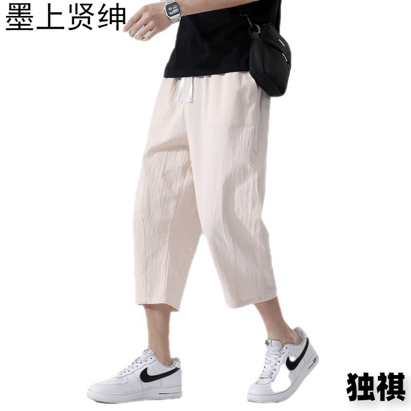 Pantalones recortados pantalones casuales de los hombres de moda verano de los hombres delgados sueltos versión coreana de los hombres de algodón y lino de gran tamaño al por mayor