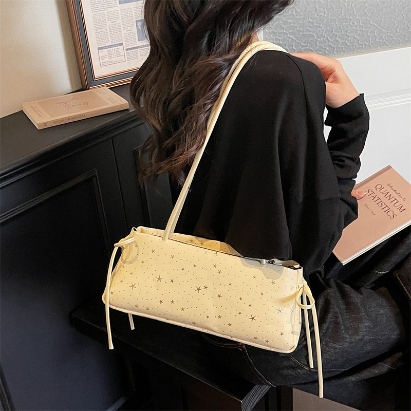 2026 primavera nuevo estilo de moda coreano lleno de estrellas de textura bolso de hombro bolso de mujer diseño de sensación diaria nicho bolso de brazo