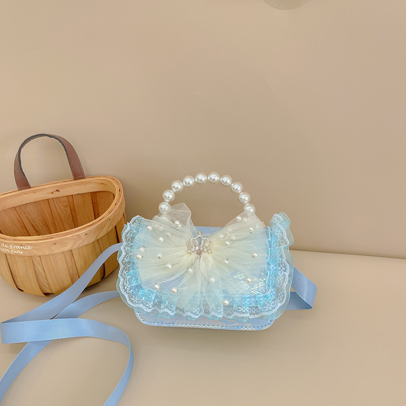 Bolsa de niños de estilo extranjero bolso de perlas bolso de hombro de encaje arco lindos princesa mochila