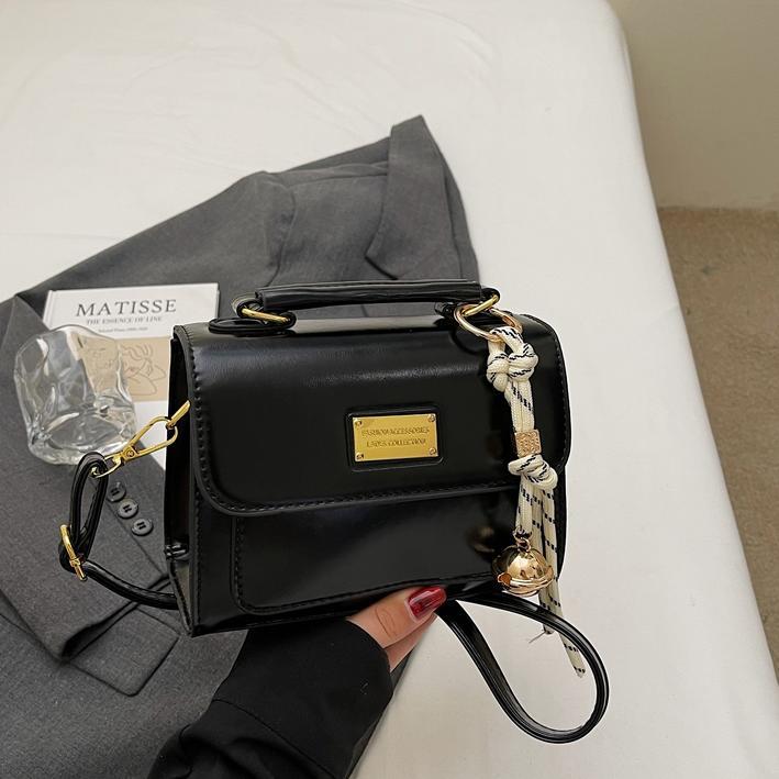 Simple y popular bolso de mano 2025 nuevo estilo de moda retro bolso de hombro coreano alta sensación mochila de mujer