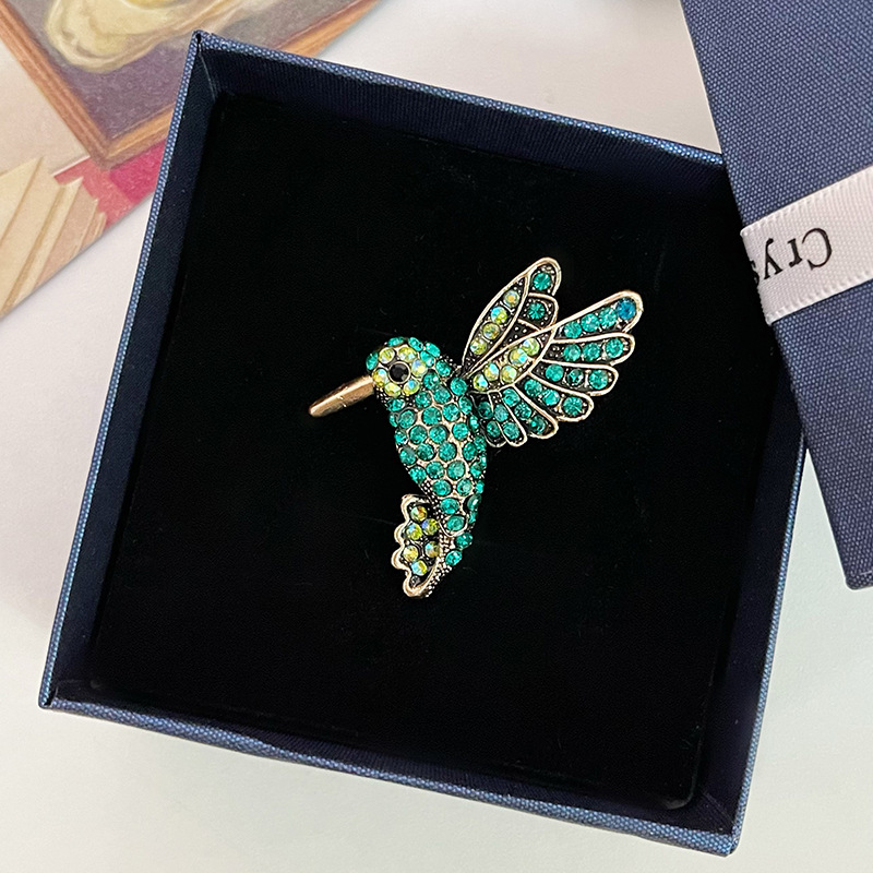 Spilla a forma di uccello con strass accessorio elegante animale_voghion.com