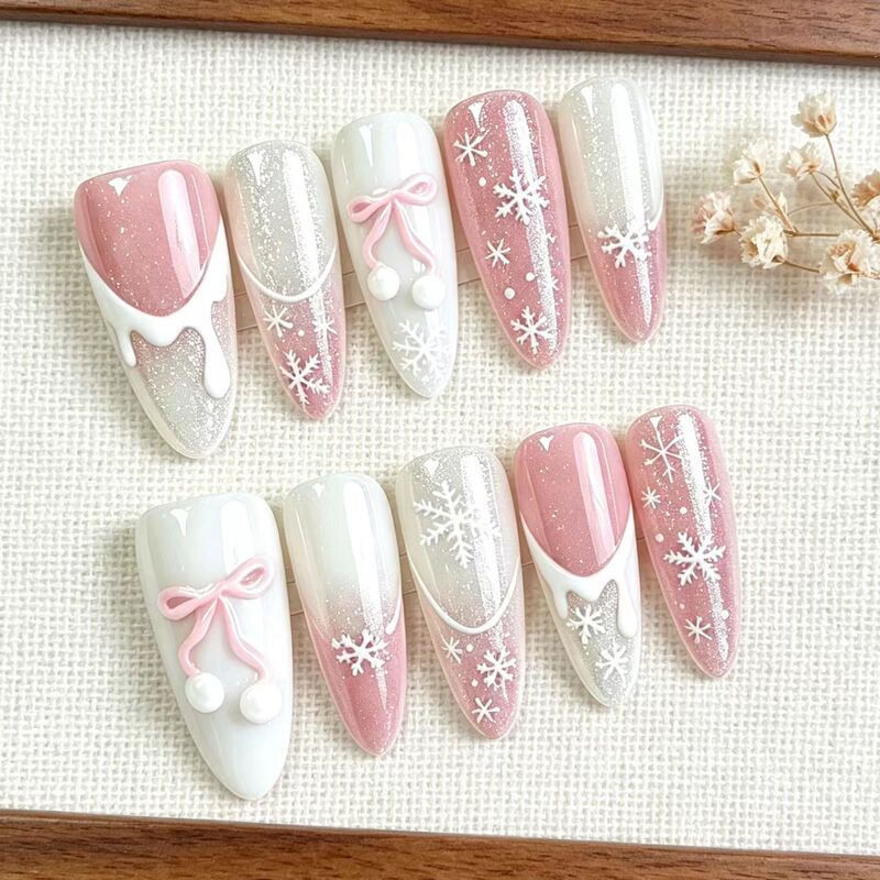 Cross-border Christmas nail art: bowknot, snowflake, almond-shaped nails, high-end, skin-brightening, and three-dimensional nail tips