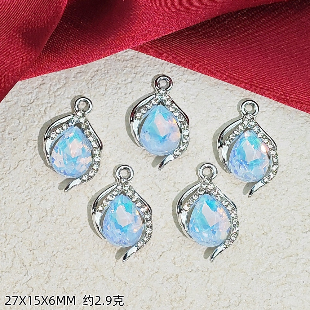 Exquisitos accesorios de joyería colgante de diamante de alta protección ultravioleta al por mayor collar DIY artesanal colgante de materiales de ropa de pulsera