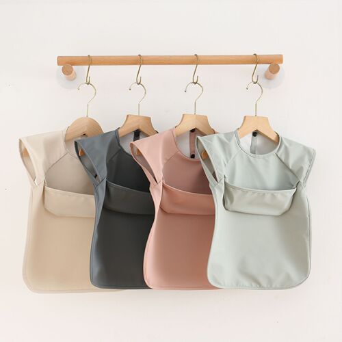 Danish children's sleeveless pu reverse-dressing baby eating clothes bib super soft waterproof solid color rice pocket anti-dirty feeding clothes