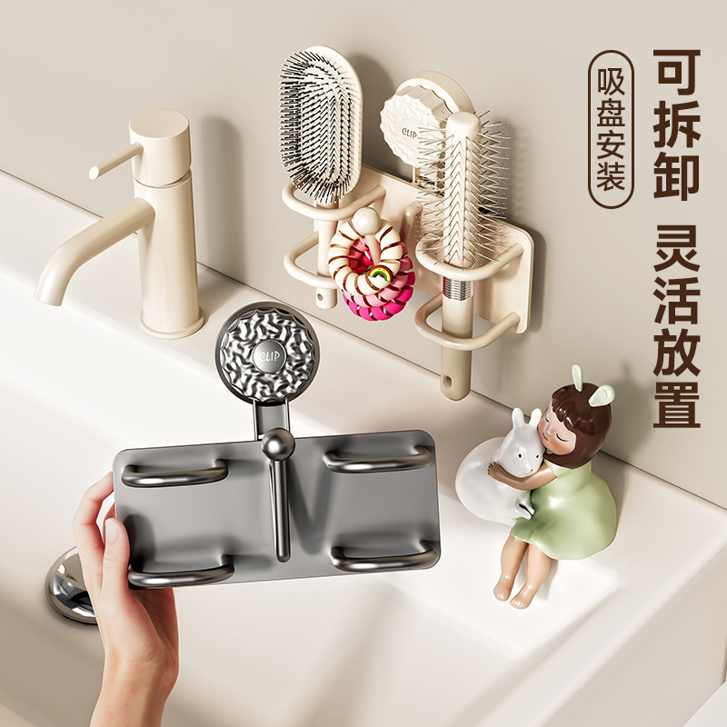 トイレの髪輪のカチューシャのひもは浴室の壁掛けの収納棚をフックします。|undefined