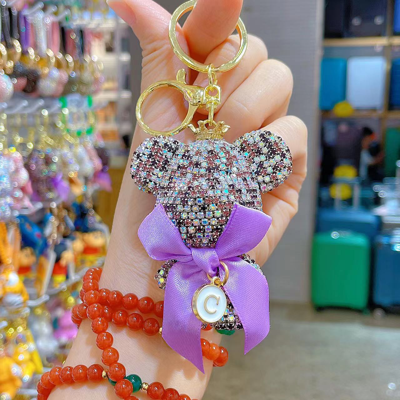 Venta directa de fábrica de lujo completo diamante muñeca llavero pajarita cabeza grande oso completo diamante bolsa colgante coche llavero