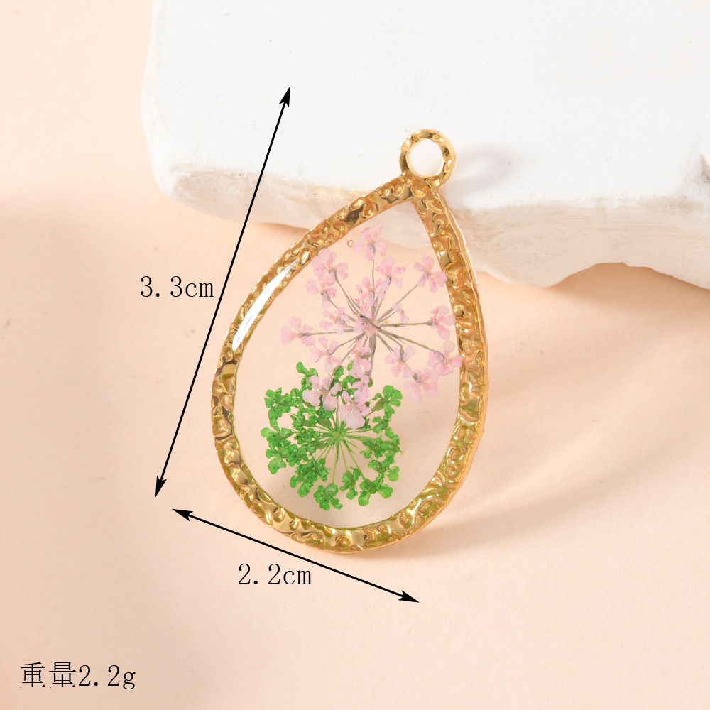 Colgante único suministro transfronterizo transparente colgante de flores inmortales accesorios joyería diy flores secas colgante colgante al por mayor