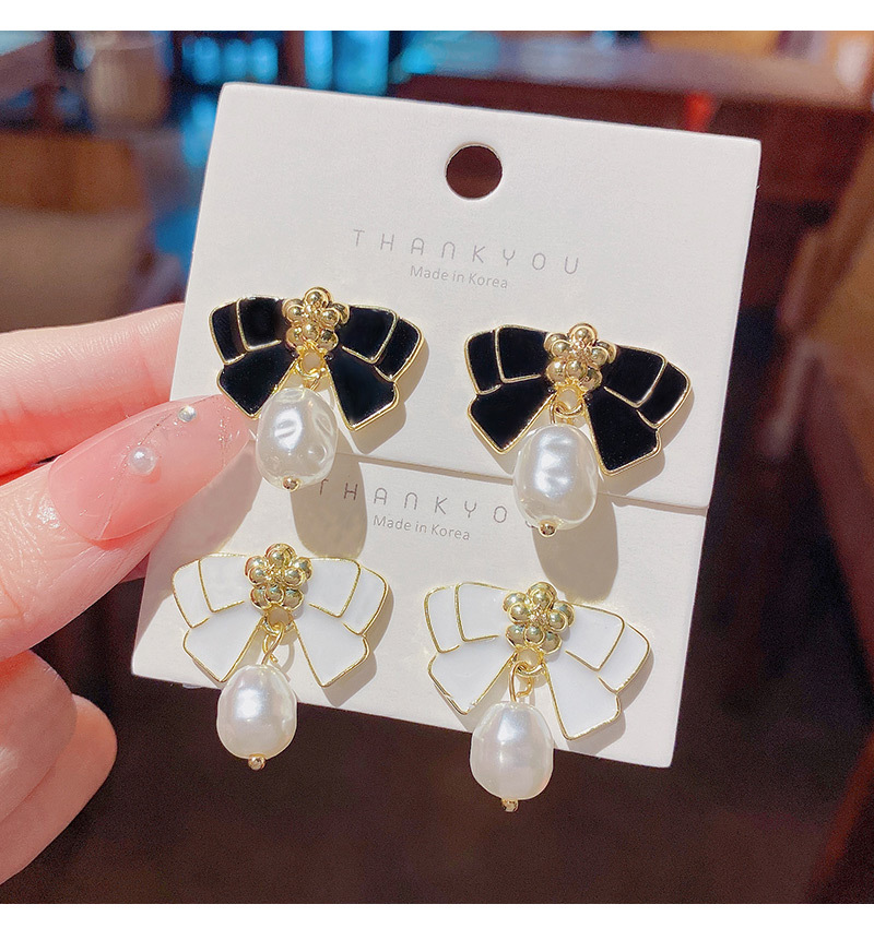 Fashion Dripping Oil Bow Flower Big Pearl Pendant Alloy Earrings Wholesale
