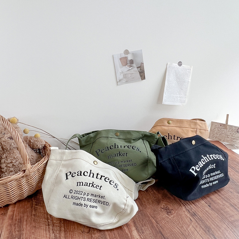 Bolsa de mensajero de los niños de moda fresco estilo coreano de gran capacidad de la bolsa de aperitivos simple carta lienzo bolso de hombro de los niños