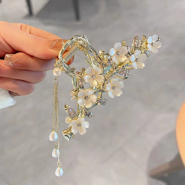 Crab pin with tassels, flowered