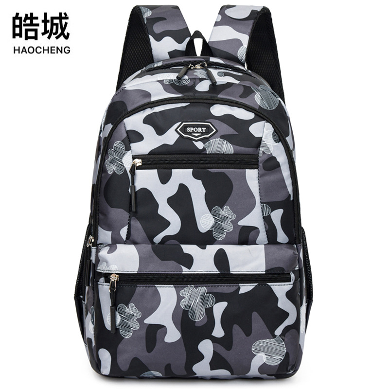 2024 nueva mochila casual de todo fósforo para estudiantes de secundaria y preparatoria de gran capacidad 15,6 pulgadas computadora reducción de carga mochila escolar al por mayor