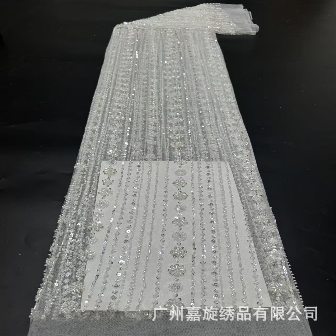 Tela de malla de aire de moda europea y americana de estilo pesado tubo de perlas esquinilla perlas clavado vestido de boda cheongsam vestido de tela