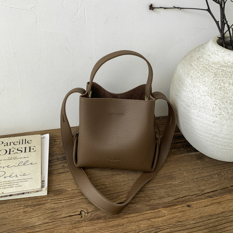 Bolsa de cubo de mano coreana 2026 nuevo nicho diario bolso de cubo bolso de mujer gran capacidad de transporte de viaje mochila