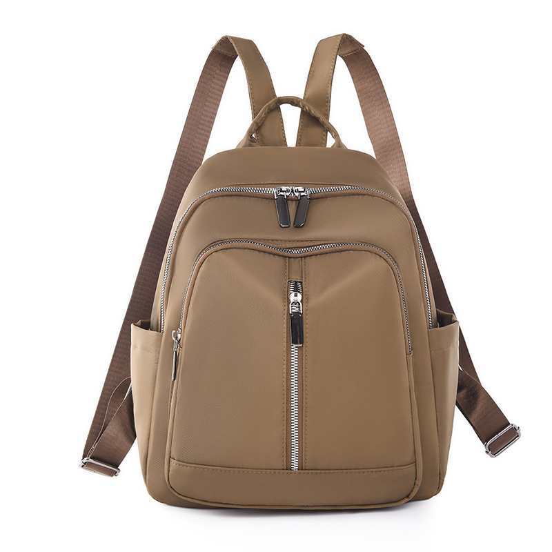 2023 nueva mochila de nailon casual para mujer, simple y versátil, gran capacidad, color sólido, mochila de mamá de viaje al por mayor