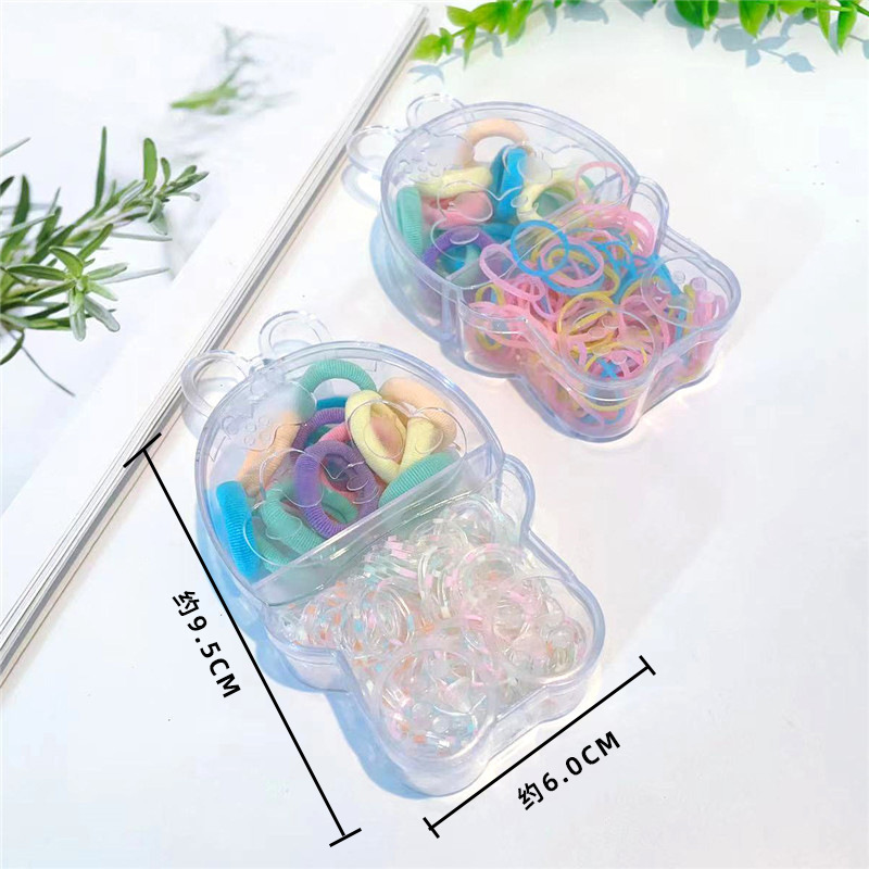 Invierno nuevo color transparente en caja cuerda de pelo accesorios para el cabello dos en uno joyería de las niñas anudadas dos yuanes tienda de tocado al por mayor
