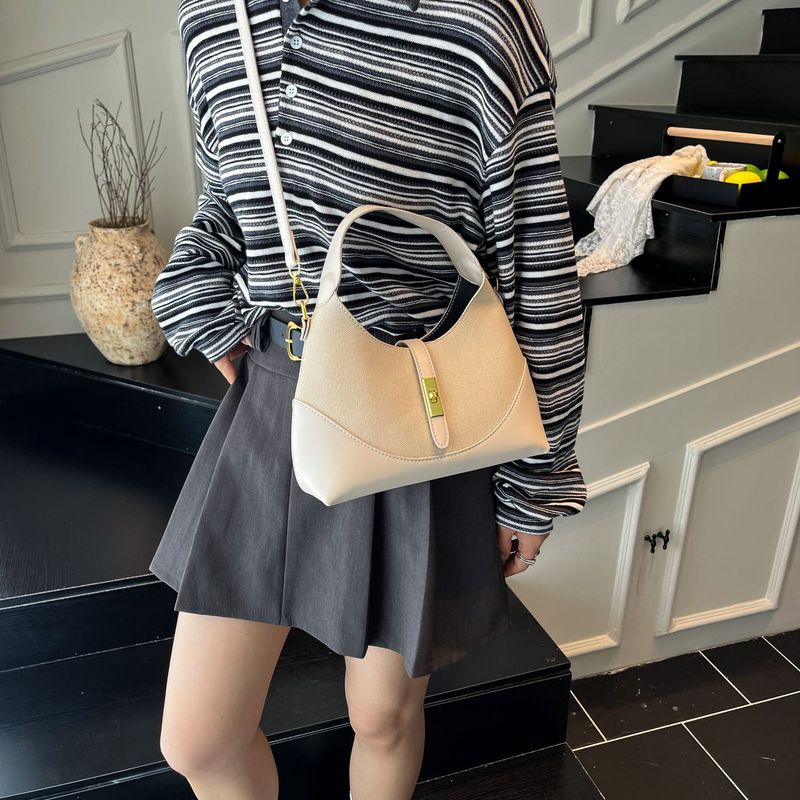 感撞色小众设计包包女2025新款水饺包百搭通勤手提斜挎腋下包|undefined