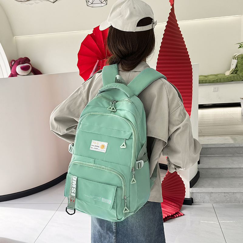 New casual middle school student schoolbag large capacity lightweight girl backpack simple female college student travel backpack