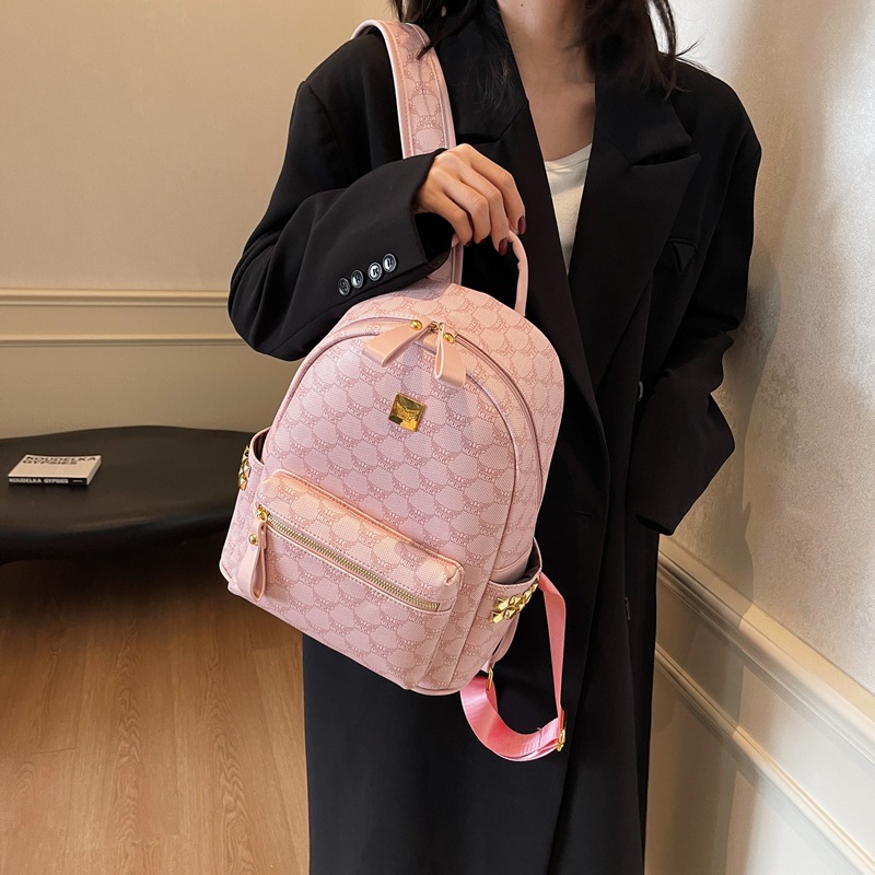 Mochila de estilo universitario de moda para mujeres 2025 nuevo viaje de viaje mochila de estudiantes adorable oso impresión mochila de moda