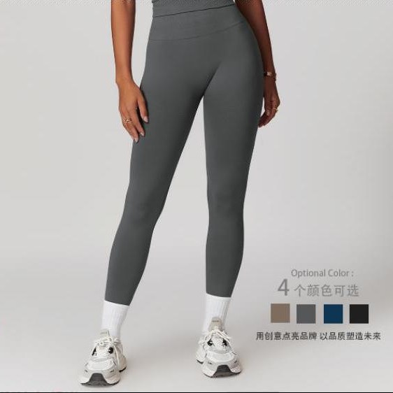 Europa y los Estados Unidos apretado cintura alta elevación de cintura de tornillo cabeza abdominal pantalones de entrenamiento para mujeres pantalones de carreras