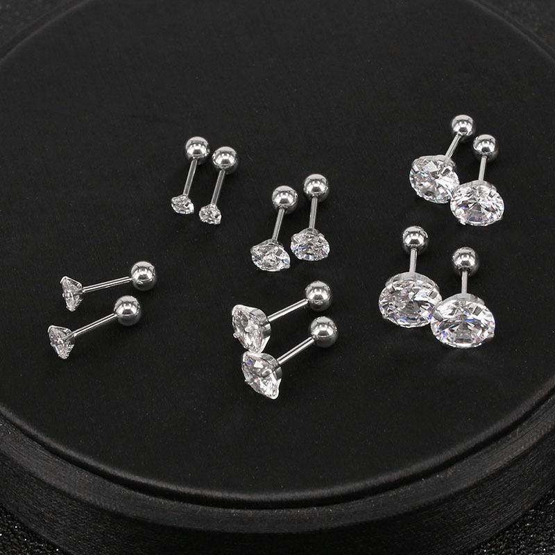 Silver pointed spike labret stud material detail