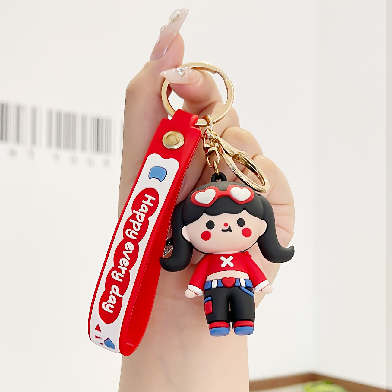 Muñeca de goma goteando bolsas escolares colgantes colgantes de muñecas colgantes de la máquina del mercado nocturno regalos al por mayor llaveros de dibujos animados