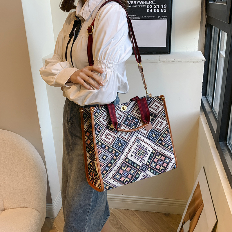 Gran capacidad lona Plaid Portátil Bolsa femenina 2024 transfronteriza primavera nuevo trabajo viajero hombro bolsa de mensajero