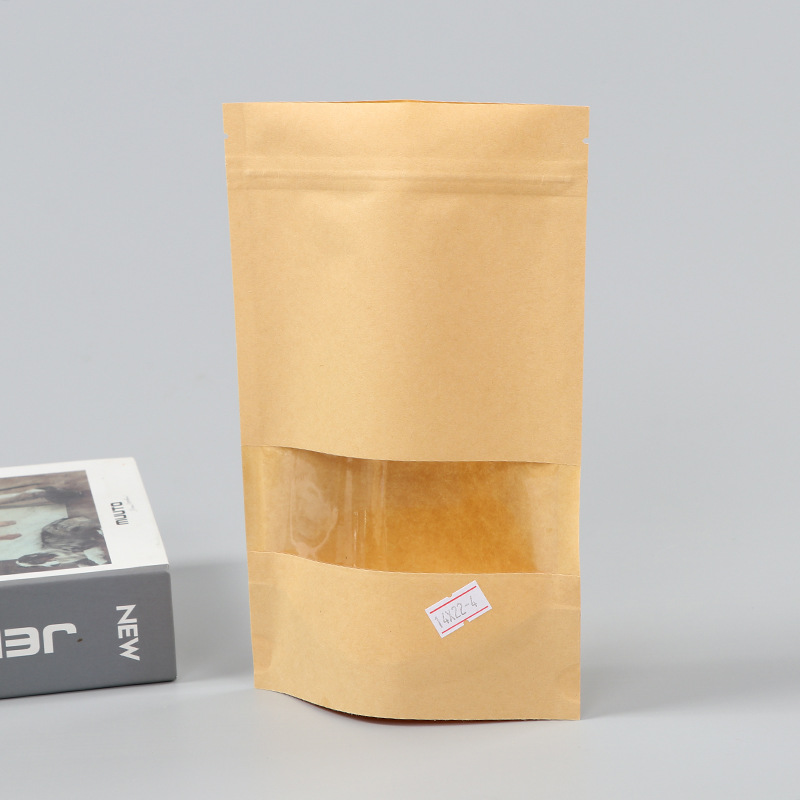 Spot bolsa de papel kraft con ventana transparente bolsa de embalaje de alimentos autosellada autoportante bolsa de té sellada de ocho lados fácil de rasgar