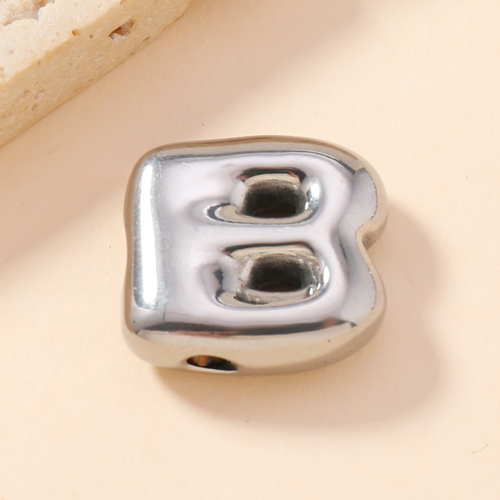 Colgante único venta cruzada de burbujas de fundición 26 collares de letras inglesas accesorios colgante DIY joyas de acero inoxidable