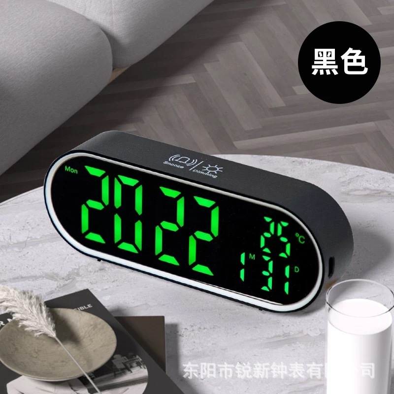 Reloj despertador electrónico ovalado de plástico, venta directa de fábrica, multifuncional, se puede usar como espejo, estilo coreano simple.