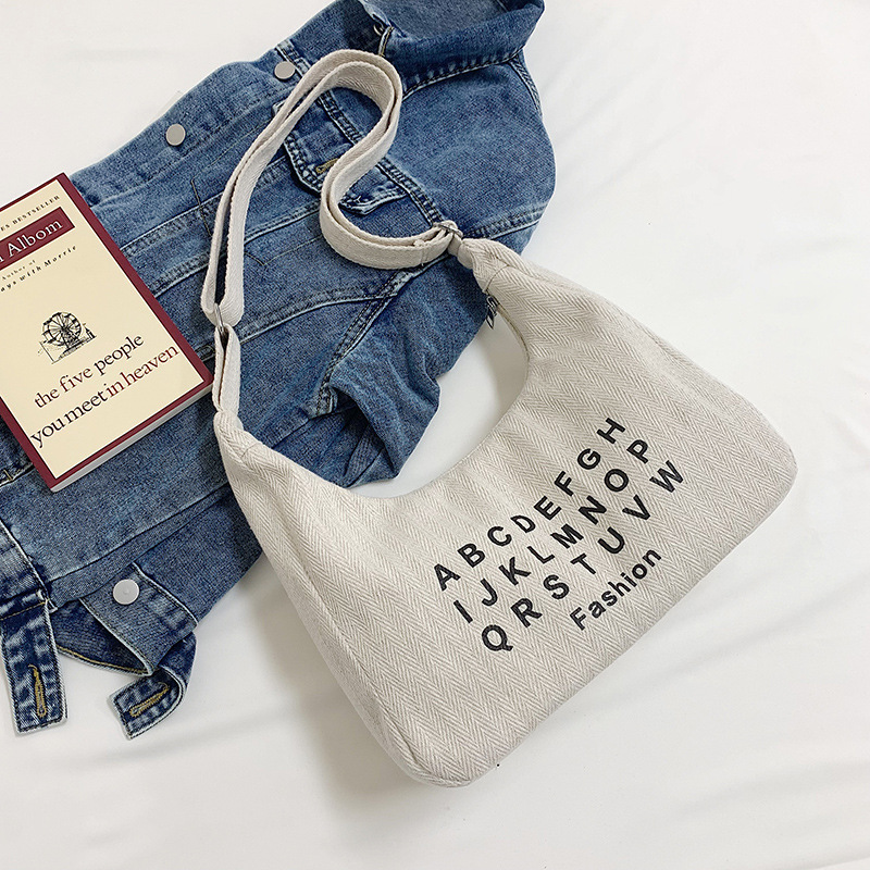 Bolso Tote de gran capacidad de moda literaria para mujer 2024 verano nuevo bolso de hombro casual simple bolso de mensajero de sentido avanzado