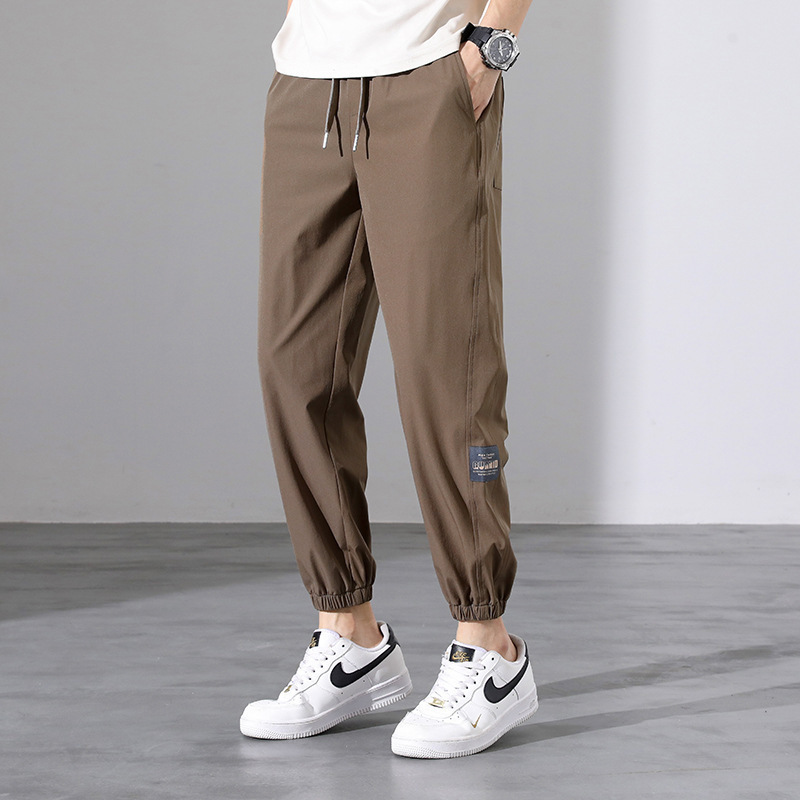 Otoño y primavera de verano de tendencia suelta pantalones casuales de pies de hielo pantalones de hombre nueve pantalones fuente de fabricación