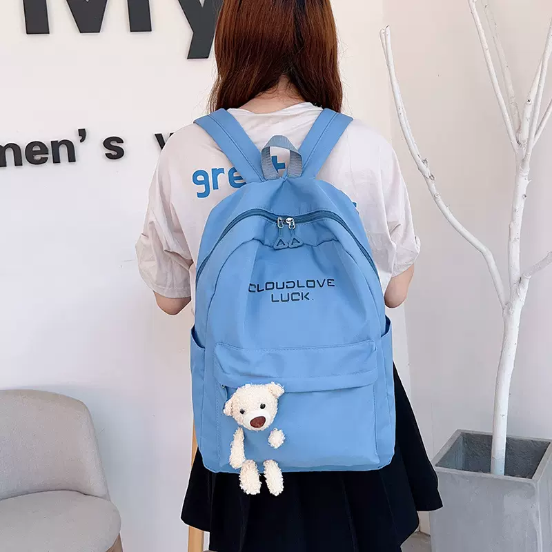 书包女初中大学生纯色简约2024唯美潮流小众校园双肩包休闲背包