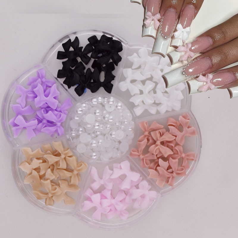 Venta caliente transfronteriza cinta de arco de uñas perla diamante Aurora oso 7 rejilla tocadiscos joyería de uñas al por mayor